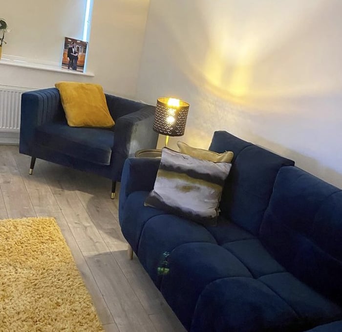 Navy blue Globe sofa and navy blue Slender armchair from @theellesmerehome